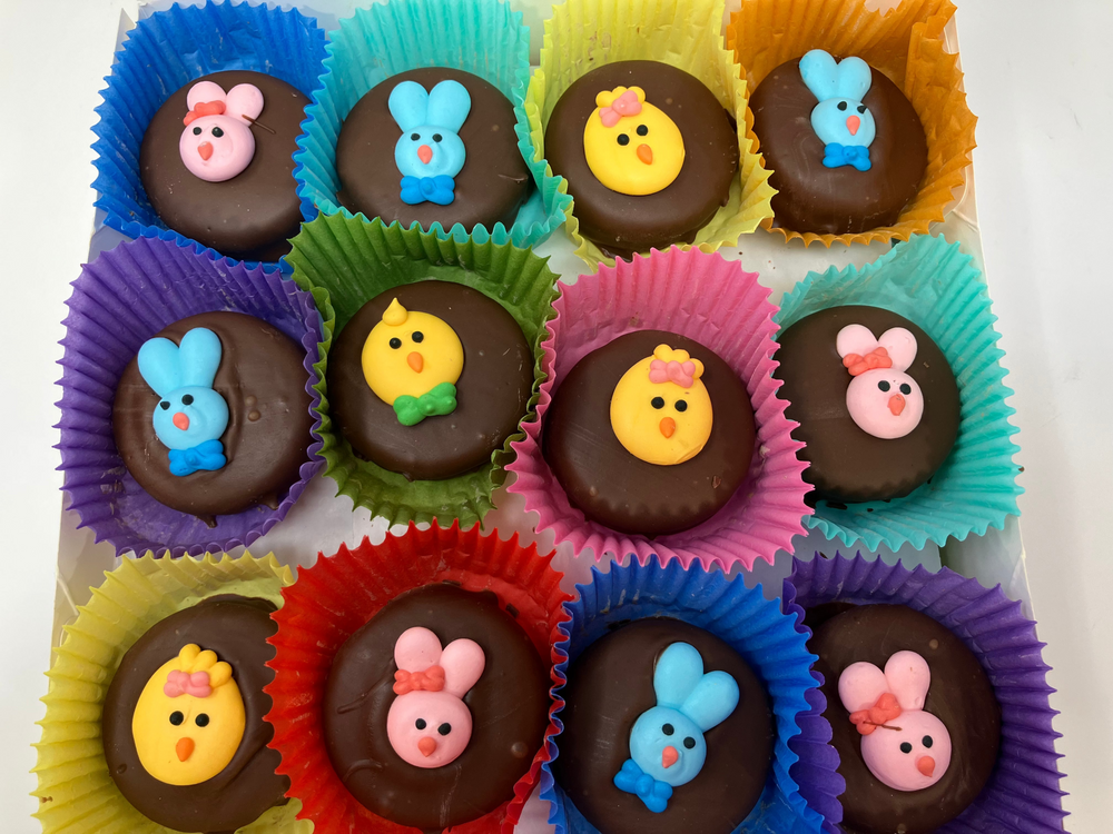 Chocolate candies with animal designs in colorful paper cups