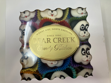 Decorative tin with 'Bear Creek' branding on a white background